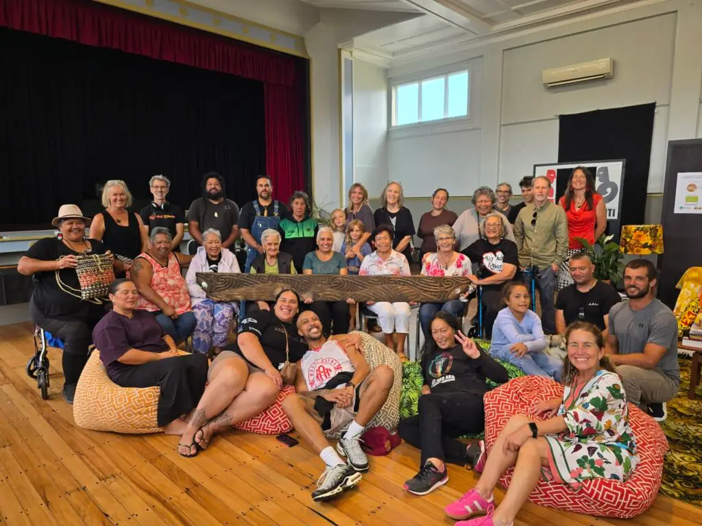 Raglan Naturally Community Trust group at Waitangi Day celebrations in Whāingaroa
